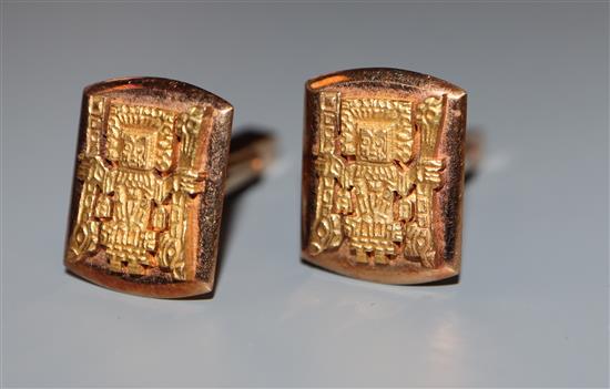 A pair of South American 18K gold Aztec design cufflinks, 15.1grams